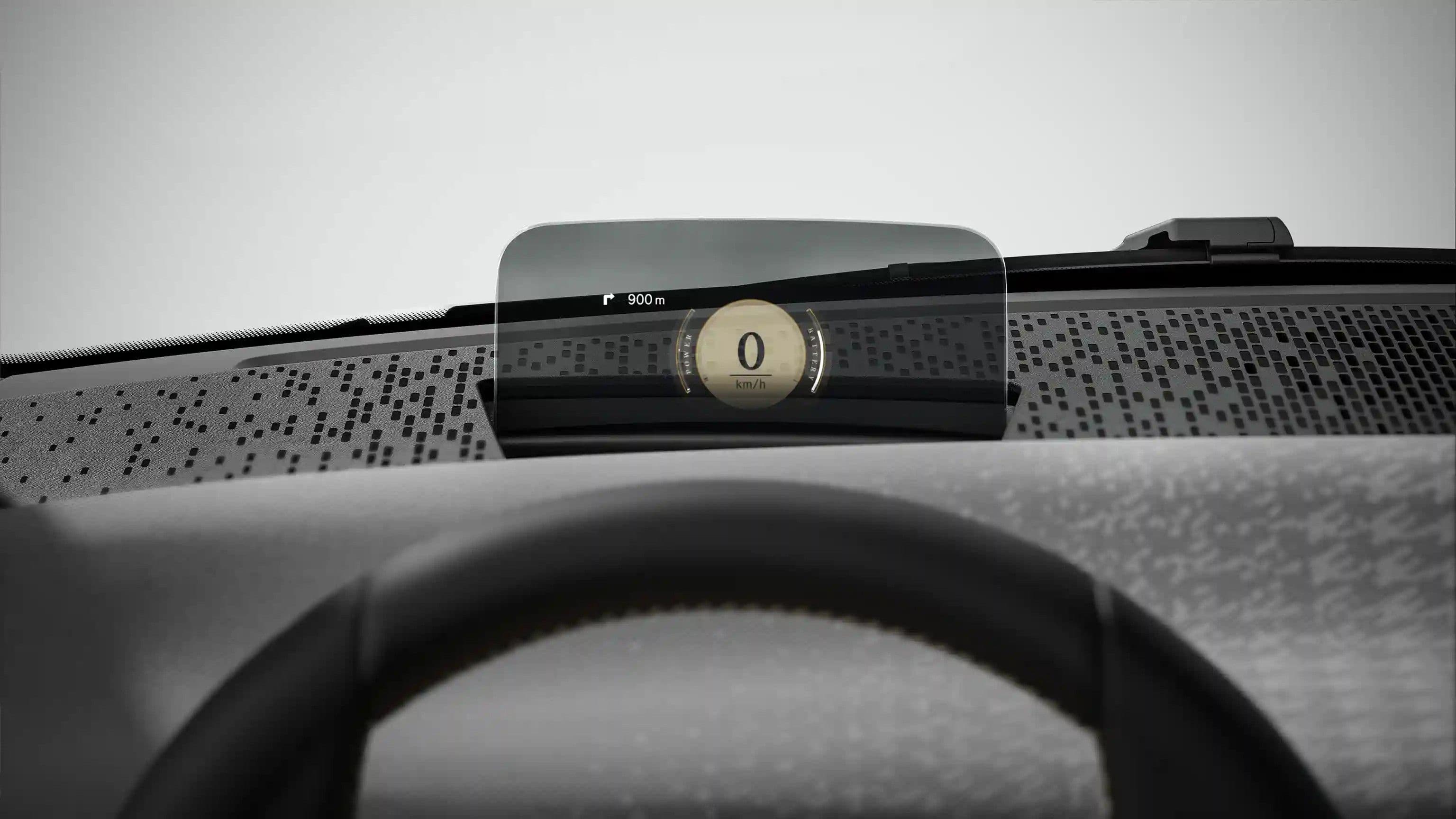 Close-up of a car's head-up display showing a digital '0'.
