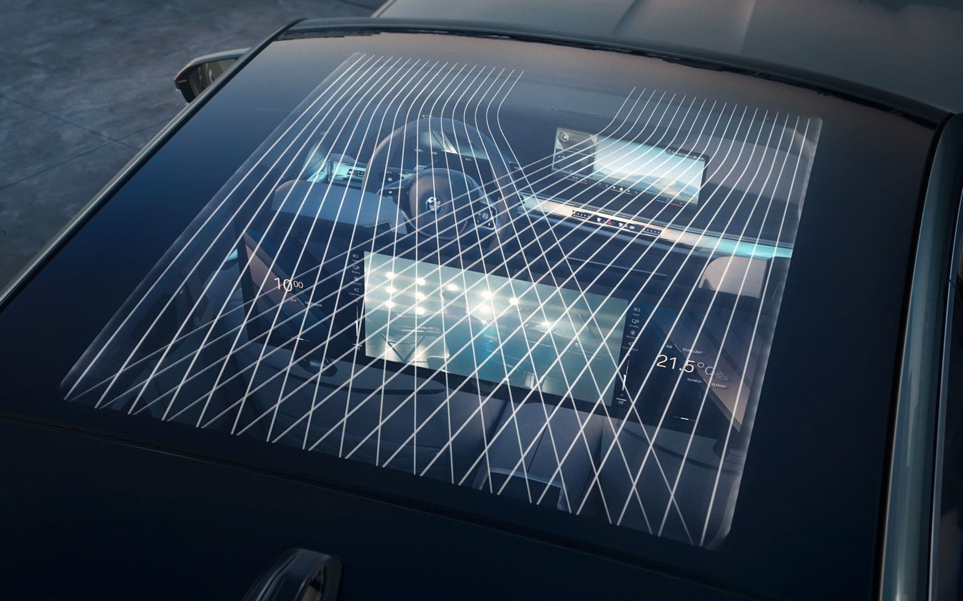 Close-up view of a car's panoramic sunroof with a digital display and a geometric pattern.